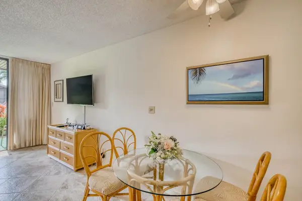 Quaint dining room for four to enjoy those quiet nights in.
