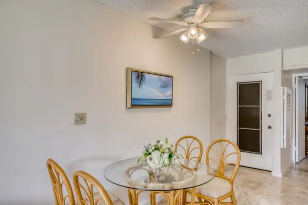 Quaint dining room for four to enjoy those quiet nights in.