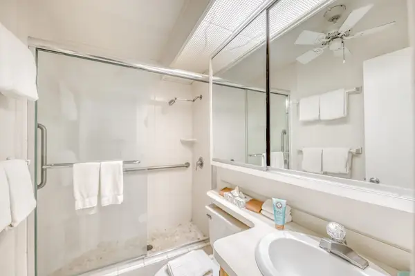 Bathroom with large tiled walk in shower.