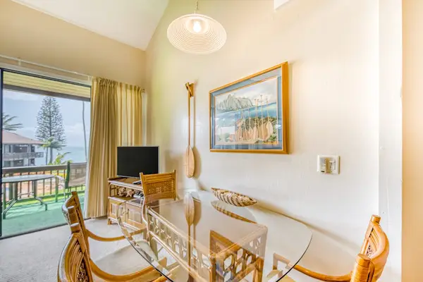 View out the sliding doors from your dining room table with this fabulous open concept floorpan.