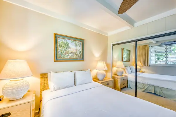 Spacious master bedroom with queen bed.