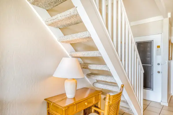Little desk under the stairs in case you need to handle any work or school while you are away.