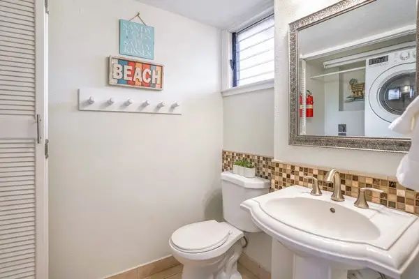 Half Bathroom with in condo Laundry