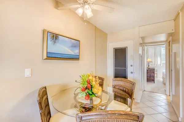 Dining room with seating for four for a relaxing night in, after a day of exploring the island.