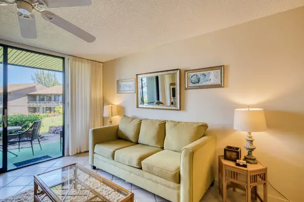Living room with comfortable sofa bed for extra guests convenience.