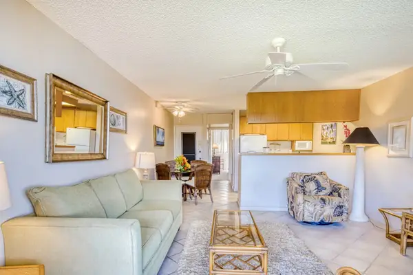 Living room with comfortable sofa bed for extra guests convenience.