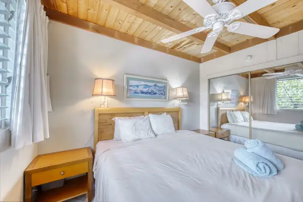 Spacious master bedroom with king bed.