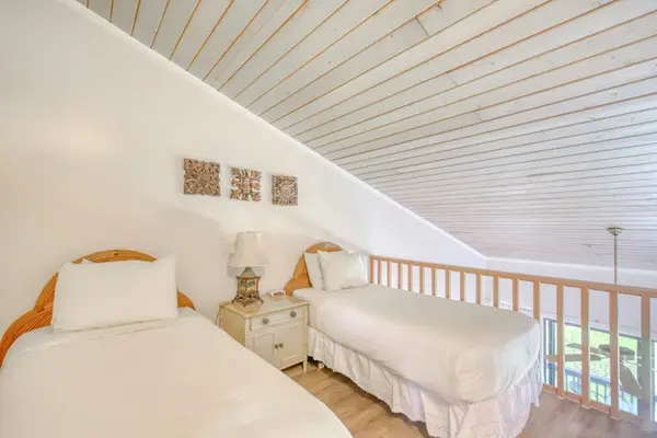 Twin beds location in the loft of the unit.