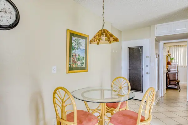 Dining room with seating for three for any nice nights at home.