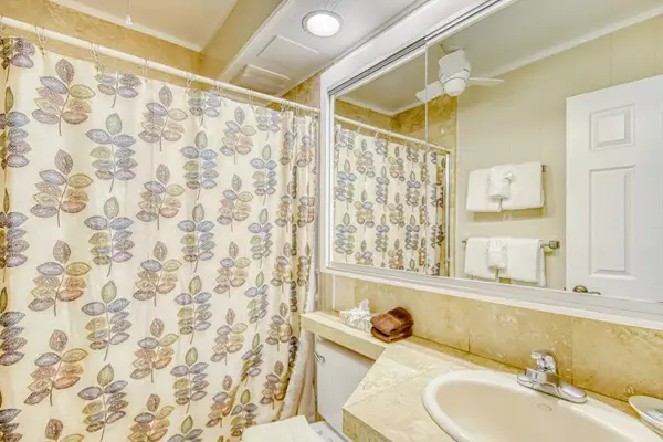 Master bathroom with shower after a long day exploring.