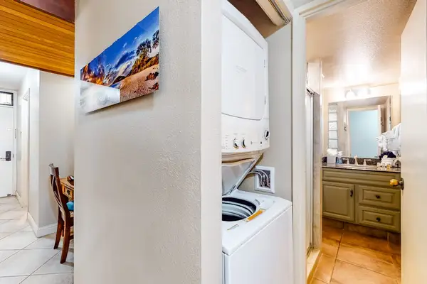 Bright vanity area with convenient in-room amenities