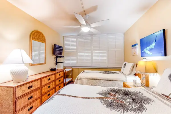 Comfortable bedroom with warm wood furnishings