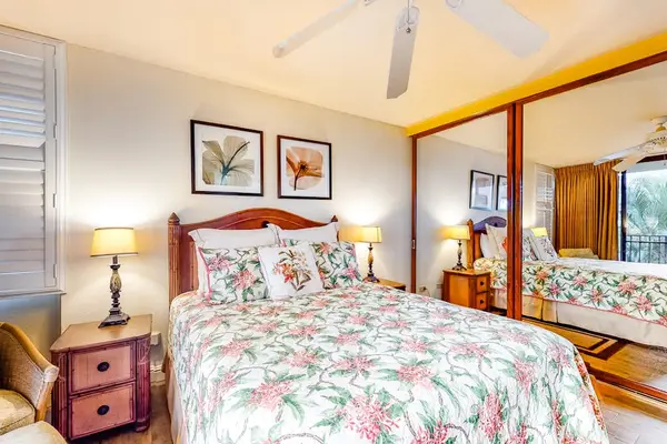 Comfortable bedroom with tropical floral accents
