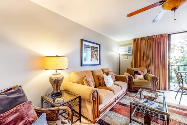 Cozy living area with comfortable seating and warm island décor