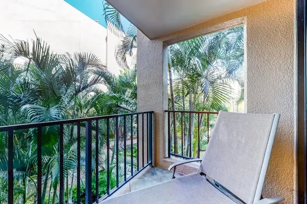 Private balcony overlooking lush tropical greenery