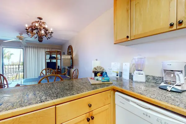 Kitchen Breakfast Bar Overlooking Dining Area & Ocean Views