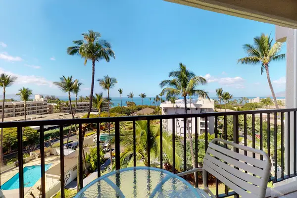 Private Balcony with Ocean & Pool Views and Bistro Seating