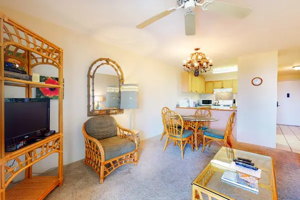 Sunlit Living & Dining Space with Entertainment Cent