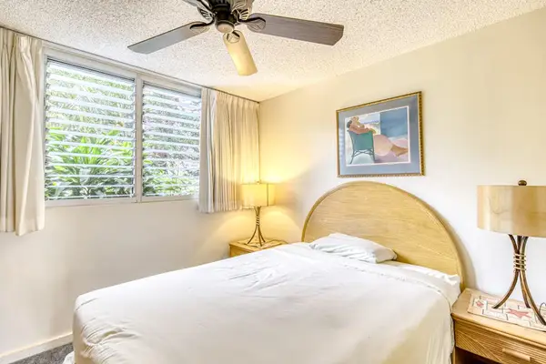Master bedroom with queen bed and ceiling fan for your evening comfort.