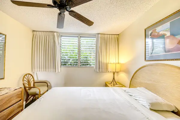 Master bedroom with queen bed and ceiling fan for your evening comfort.