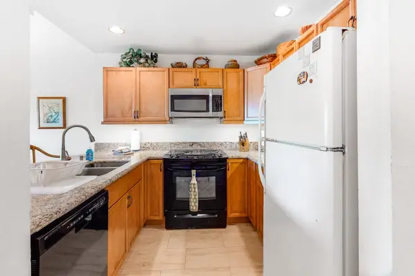 Cook, create, and savor delicious moments in this stylish kitchen