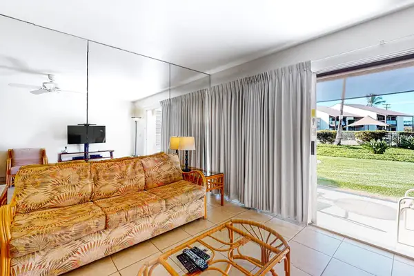Comfortable living room with lanai access
