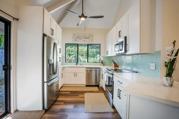 Fully remodeled kitchen with new stainless steel appliances.