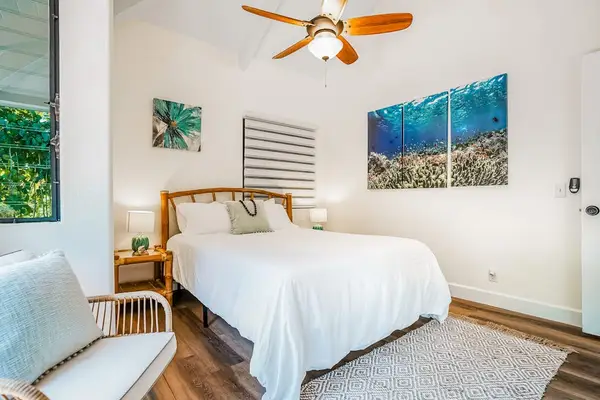 Guest bedroom with queen bed.