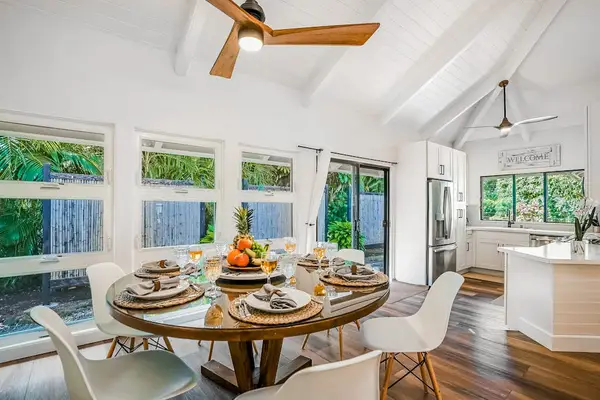 Dining room table with seating for four.