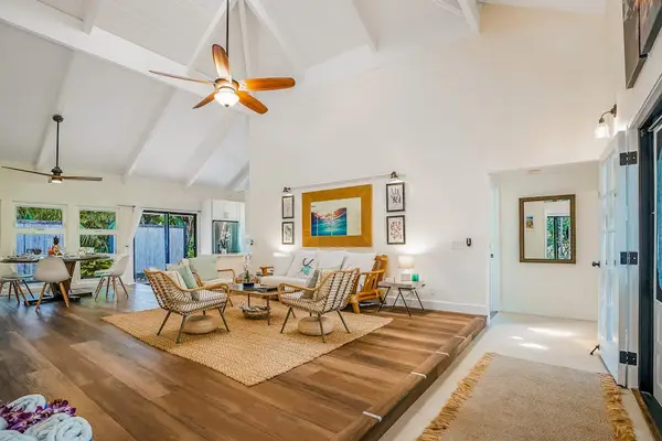 Large living room with vaulted ceilings.