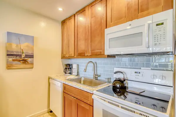 Updated kitchen with everything you need for a quiet meal in your home away from home.