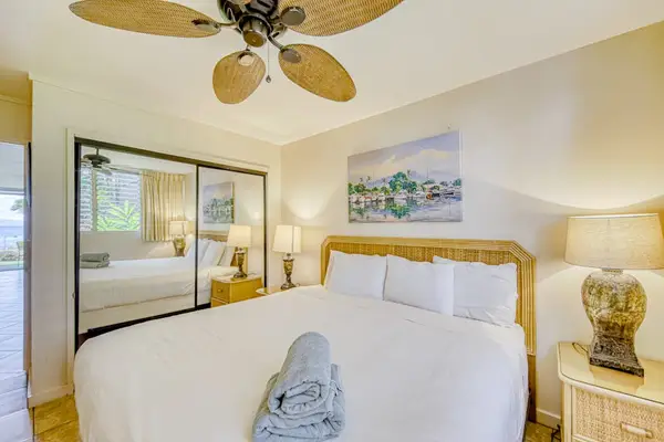 Master bedroom with king bed and ceiling fan to keep you cool.