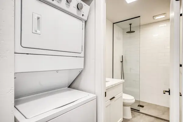 Convenient In-Unit Stacked Laundry Makes Beach Trips Effortless