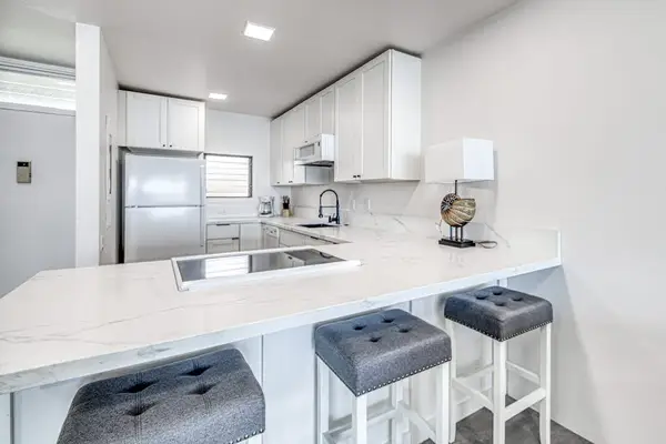 Chat With The Cook At The Chic Quartz Breakfast Bar