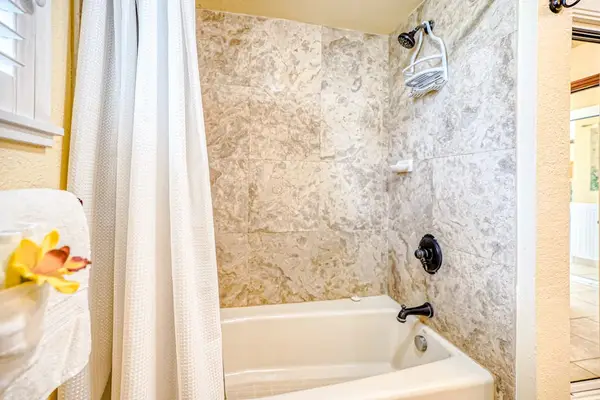 Refreshing Walk-In Shower With Stone Tile