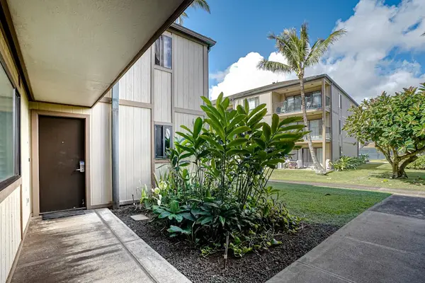 Charming Courtyard Entrance Surrounded By Greenery