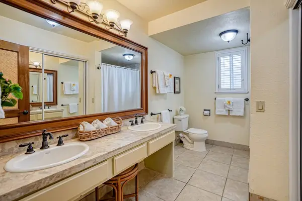 Bright Full Bathroom With Elegant Double Vanity