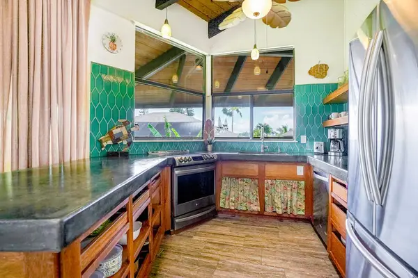 Well-appointed kitchen featuring modern appliances and ample counter space