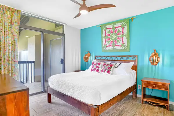 Cozy queen bedroom with island-inspired décor