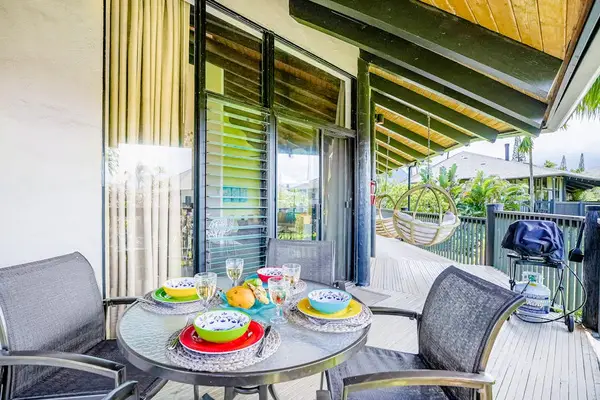 Cozy outdoor seating area on the lanai, ideal for relaxing outdoors