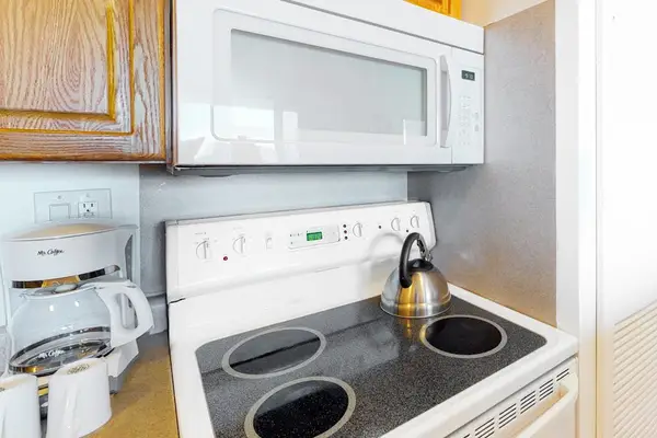 Fully stocked kitchen awaits the chef in you.