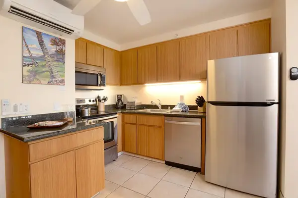 Fully equipped kitchen with generous cabinet and counter space