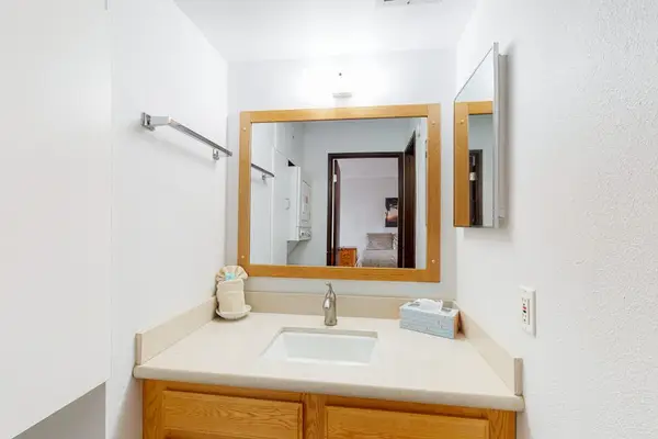 Bright bathroom with clean finishes for relaxing