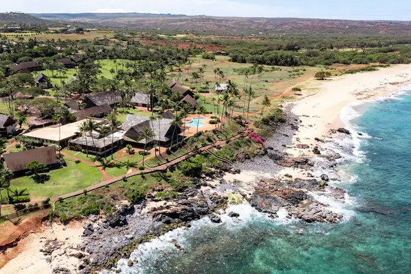 Pool and pavilion offers inviting views beside Pacific waters