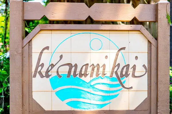 A charming sign welcoming you to paradise
