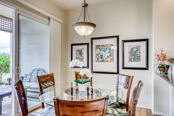 Bright dining area with lanai access