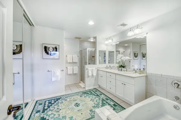 Ensuite bathroom with dual vanity and walk-in shower