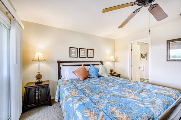 Comfortable king bedroom with natural light