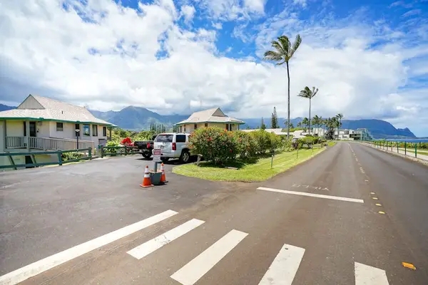 Scenic Resort Entrance With Mountain Backdrop