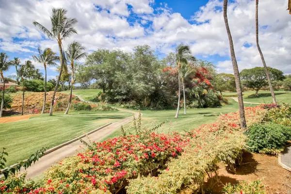 Colorful tropical gardens create a peaceful resort setting